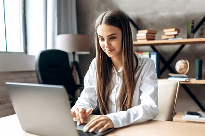 A young woman entrepreneur imbibing QNET's self development lessons
