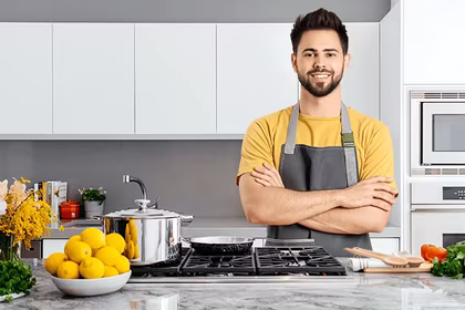 A man standing in the kitchen