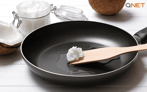 Nutriplus-Virgin-Coconut-Oil-on-a-frying-pan-while-cooking