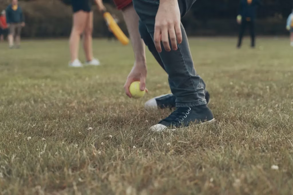 Friendship Day 2019: A person catching a ball at a cricket game