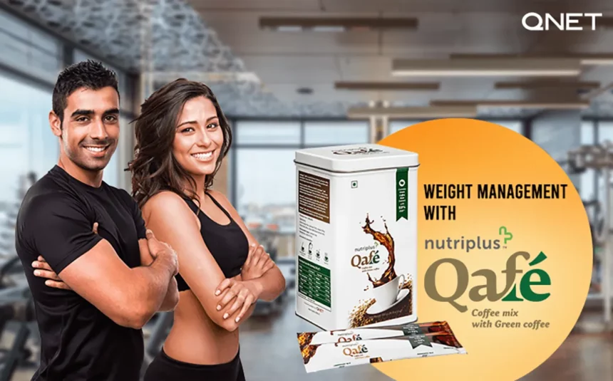 
A-fit-Indian-couple-standing-in-a-gym-folding-arms-with-Nutriplus-Qafe-in-the-frame-
